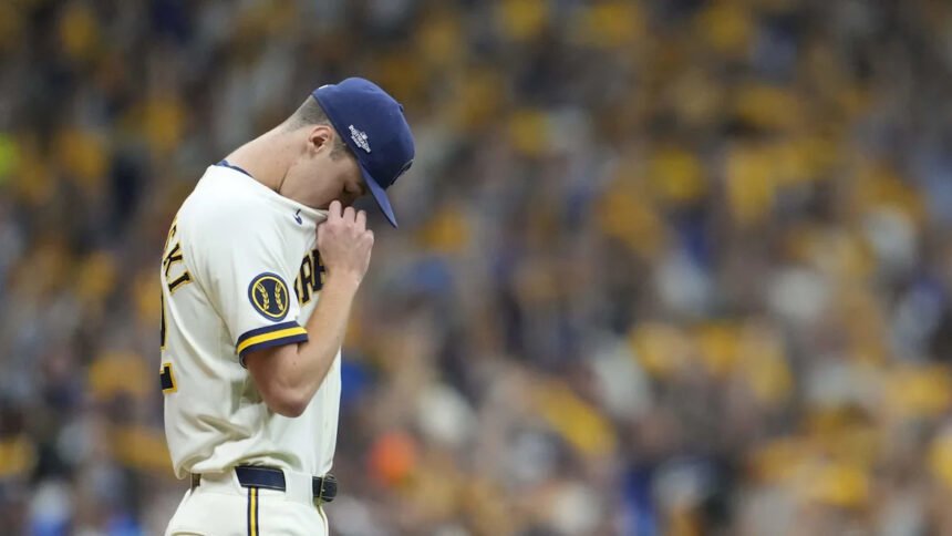 Jacob Misiorowski, wearing a Milwaukee Brewers uniform, delivering a fastball on the mound during the 2026 World Series at American Family Field.