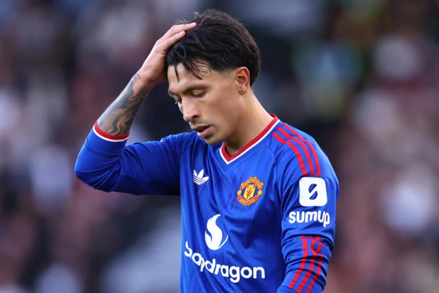 Lisandro Martinez in a Manchester United kit, looking frustrated after the 2-0 defeat to Atletico Madrid in the Champions League.