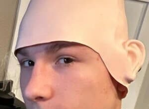 MuffinJuice wearing his cardboard box mask on a bright set