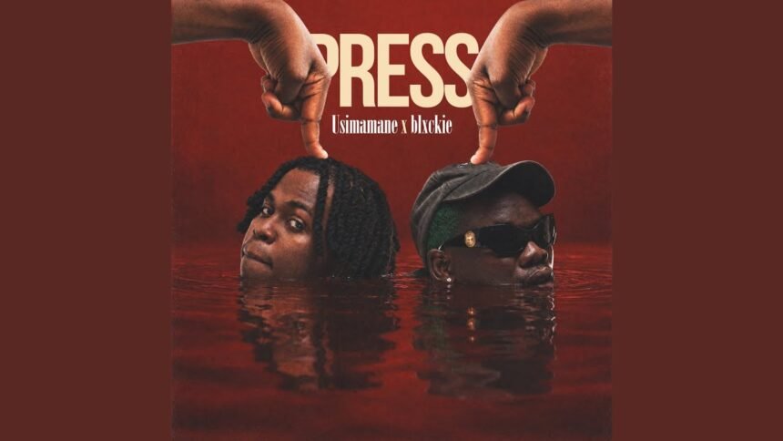 Usimamane and Blxckie together on stage performing their new single Press, with bright lights and a live audience