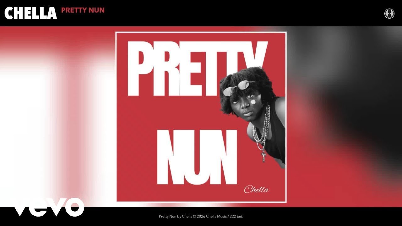 Chella singing into a microphone on stage while the title "Pretty Nun" appears on screen behind him
