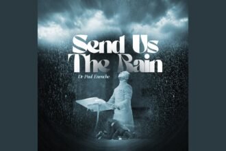 Dr Paul Enenche singing on stage during the release of Send Us The Rain