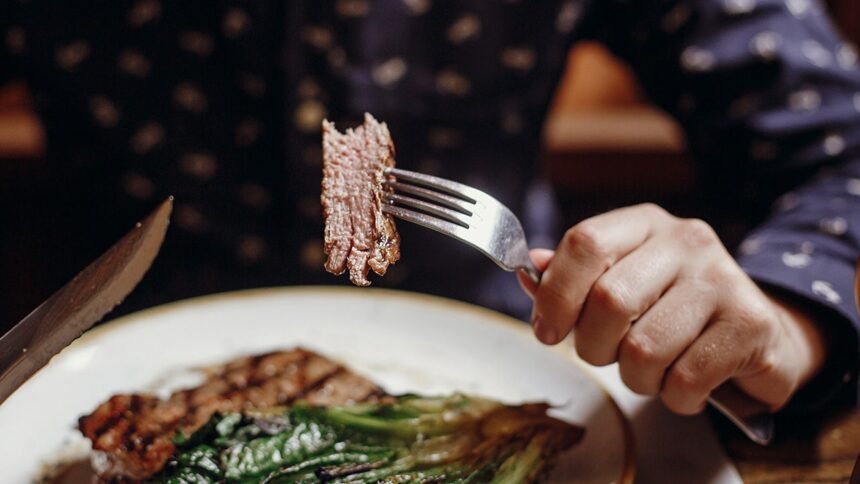 A close up view of a cooked steak plate at a restaurant