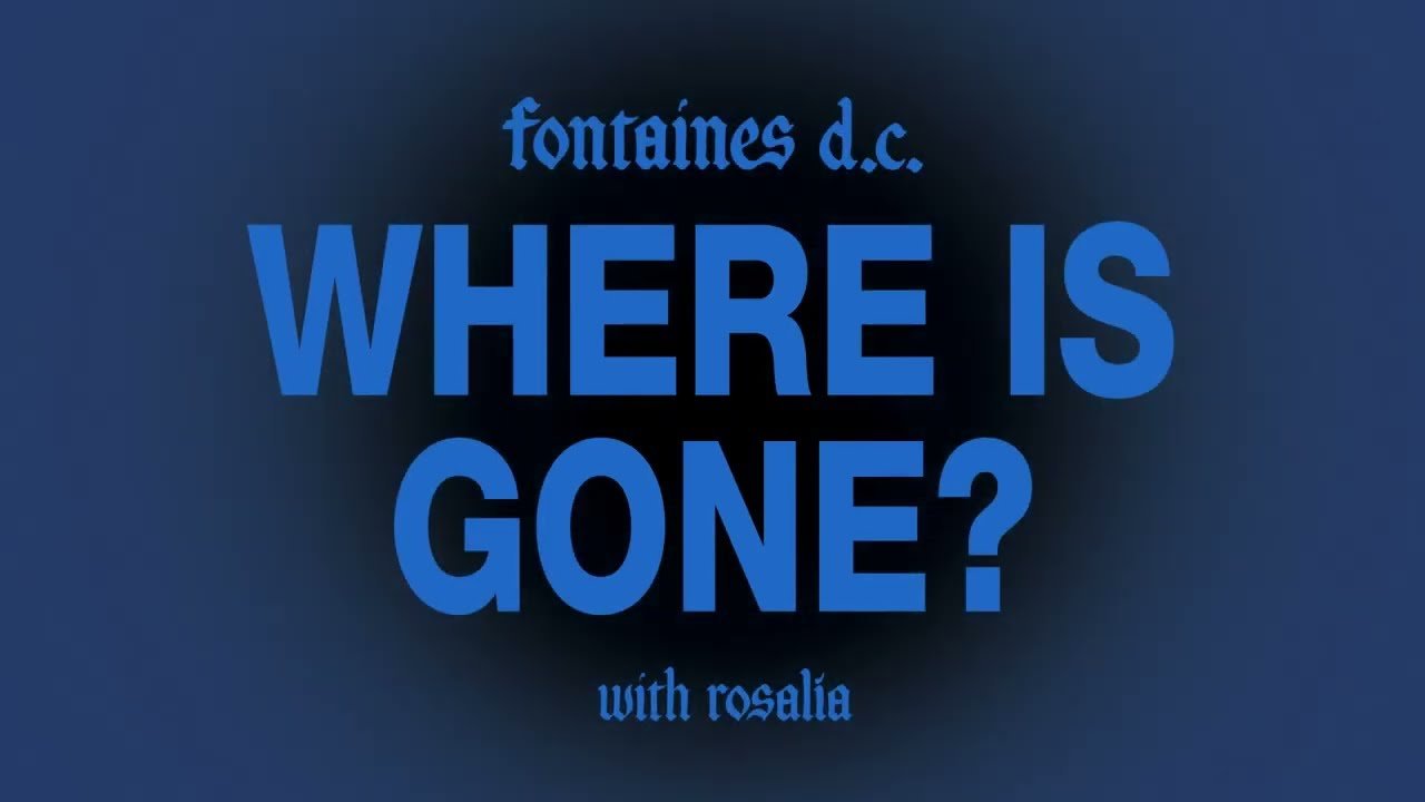 Live performance of Fontaines D.C. and Rosalía singing the song Where Is Gone? on stage with stage lights.