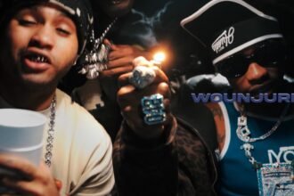 Straffitti, JeriQ, and Suono Sai performing in the official visualizer for Wounjure #Swag